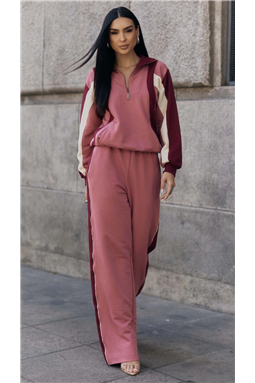 Conjunto confeccionado em tecido moletom em algod�o e poli�ster. A blusa possui modelagem ampla, gola polo com z�per de metal personalizado, manga longa, bolsos nas laterais, punho em ribana na barra das mangas e blusa, recorte nas mangas e laterais. J� a cal�a possui modelagem reta, cintura m�dia, c�s em ribana, bolsos facas laterais, bolsos nas costas.